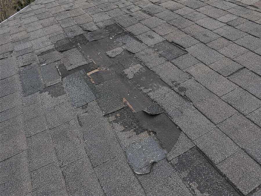 storm-damaged-roof-insurance-coverage Insurance coverage for storm damaged roofs.